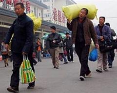 China migrant population growing, pay rises slowing